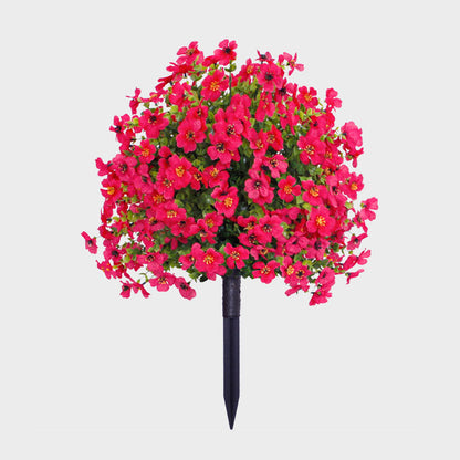 Blomsterdekoration med kunstig eukalyptus og violer