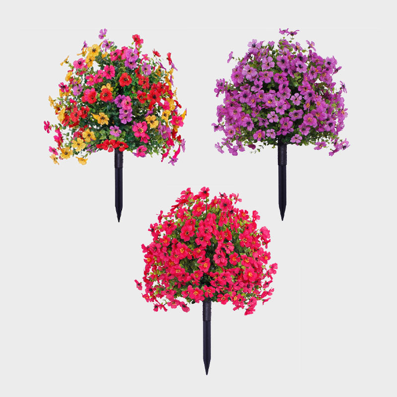 Blomsterdekoration med kunstig eukalyptus og violer