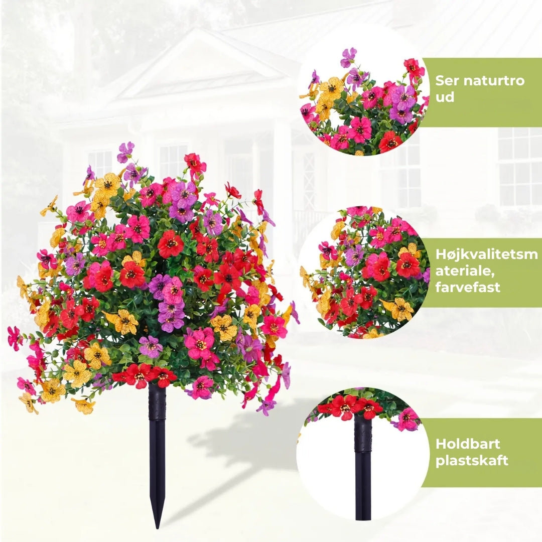 Blomsterdekoration med kunstig eukalyptus og violer
