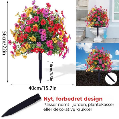 Blomsterdekoration med kunstig eukalyptus og violer