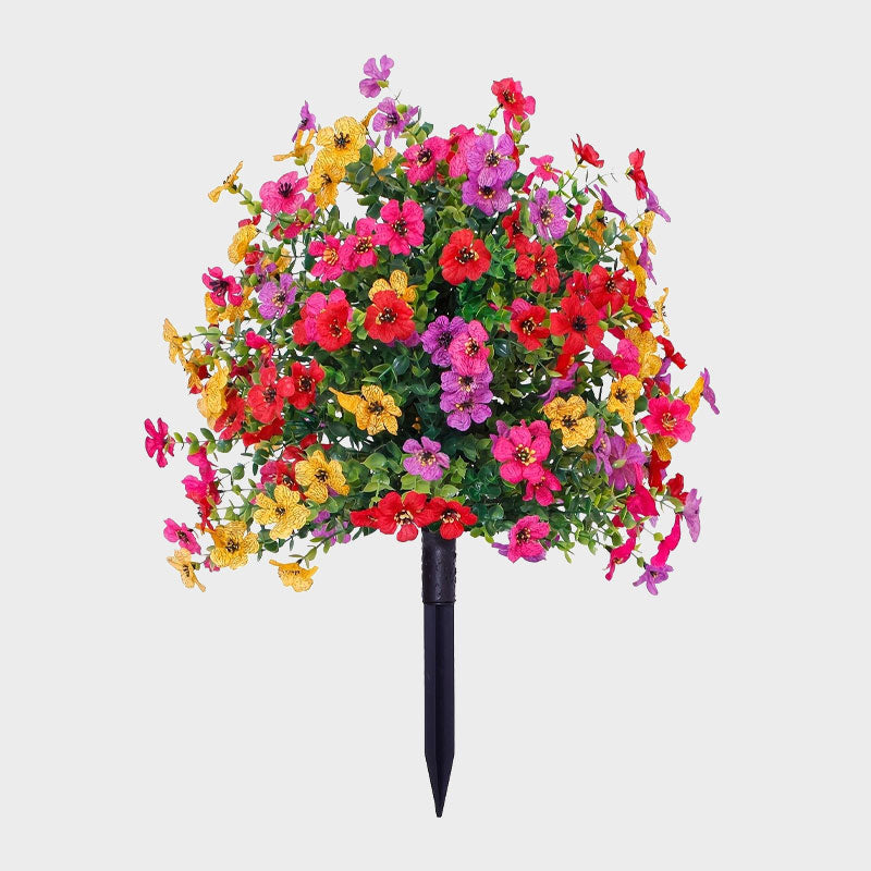 Blomsterdekoration med kunstig eukalyptus og violer