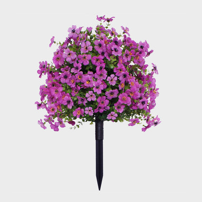 Blomsterdekoration med kunstig eukalyptus og violer
