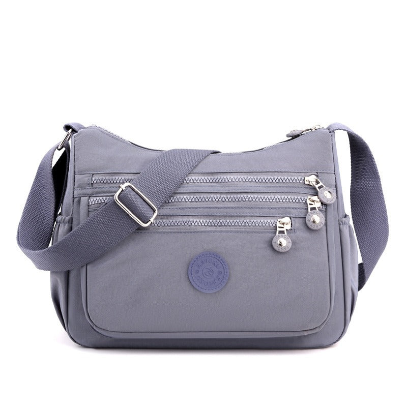 Stilfuld nylon-taske – let og holdbar